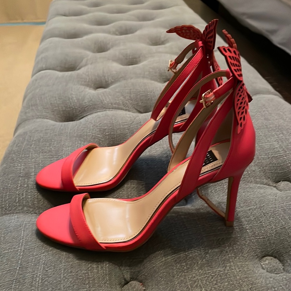 No used pink heels with butterfly wings